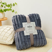 Dark gray ribbed fleece throw blanket, folded with tag